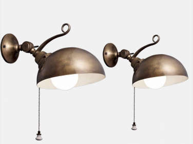 rounded brass adjustable sconce  