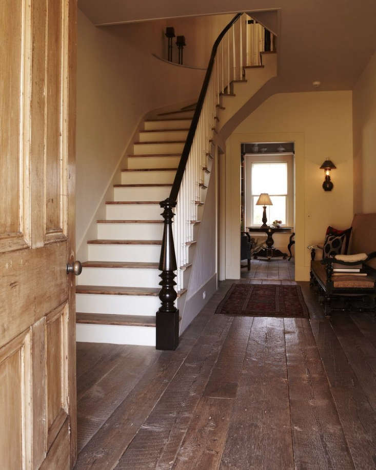  the entryway of a vermont farmhouse with reclaimed floors; see  16