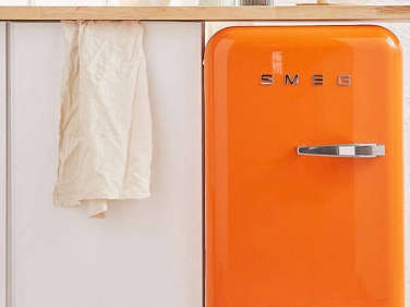 urban outfitters orange smeg fridge  