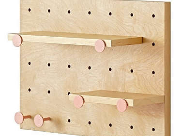 pegboard and shelves with 6 pink pegs  