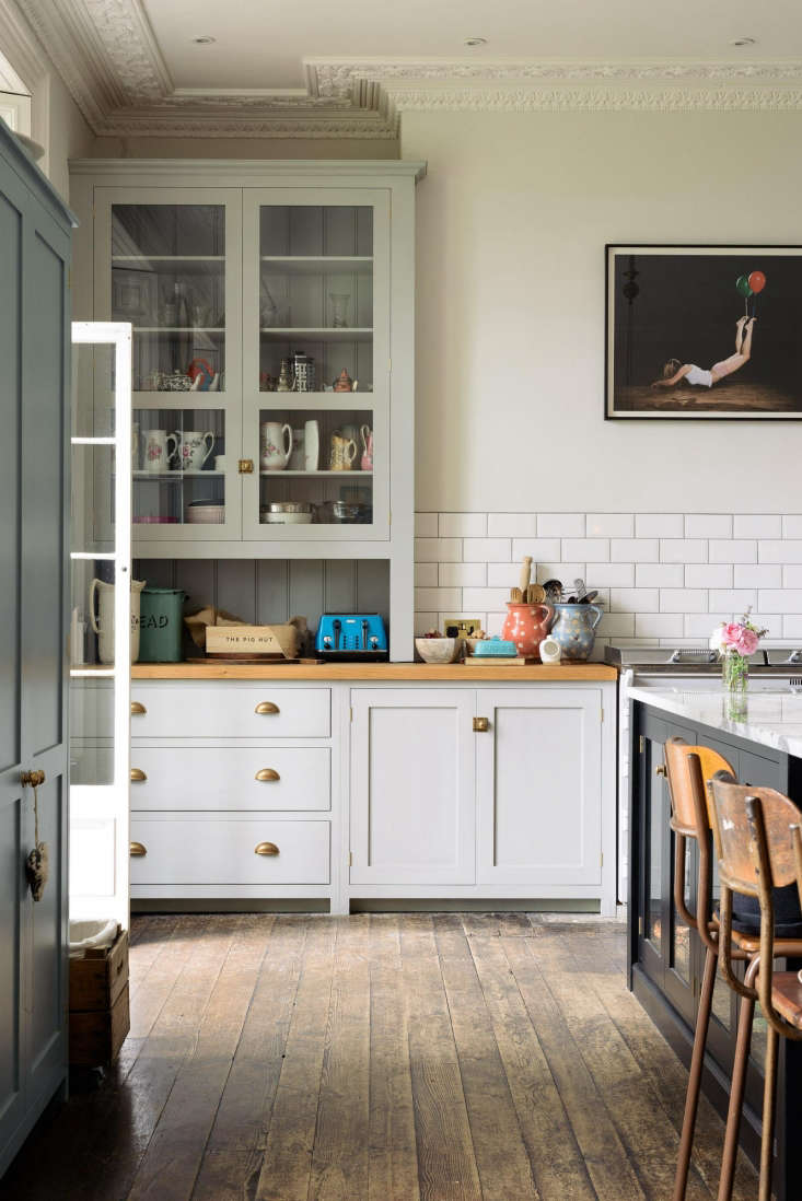Shaker style cabinetry in romantic English Country kitchen designed by deVOL