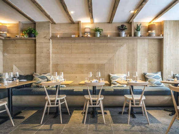 ferris restaurant interior nyc pale wood blue cushions  