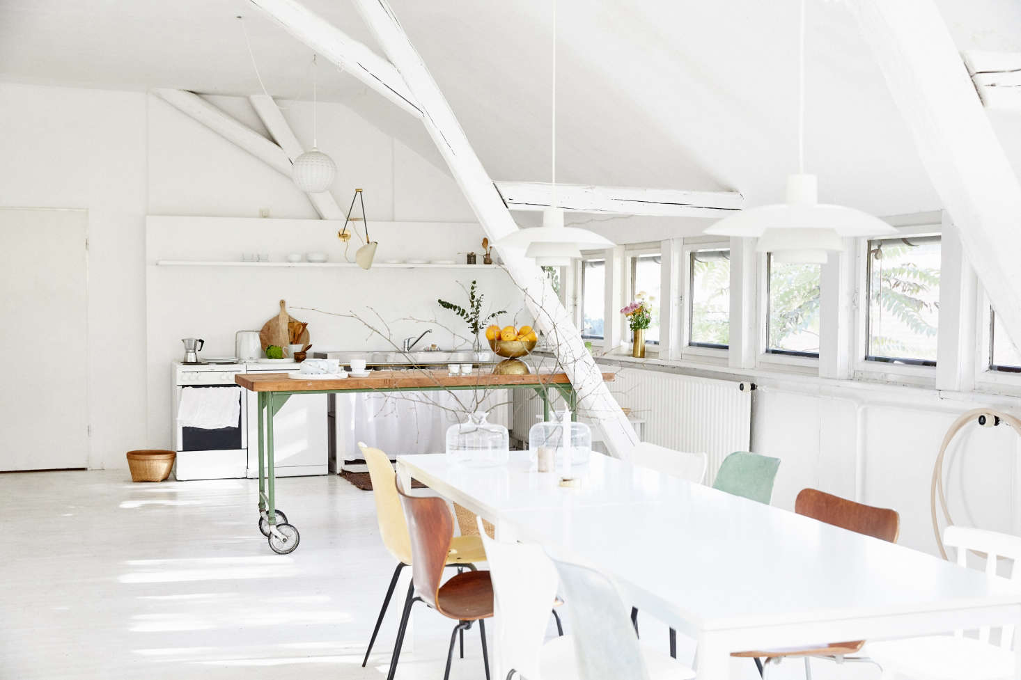 open kitchen and dining area above the lappalainen studio in a converted wareho 4
