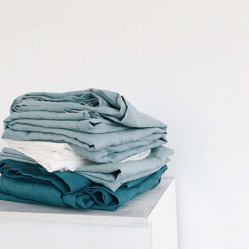 stack of sea me linens  
