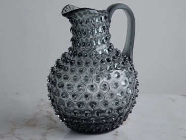 gray glass hobnail pitcher  