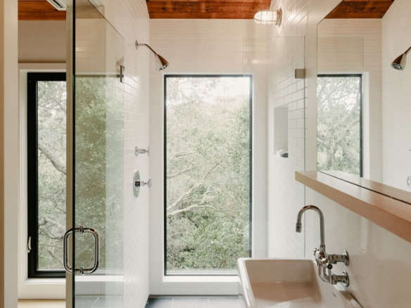 malcolm davis master bathroom wood ceiling walk in shower window   584x438