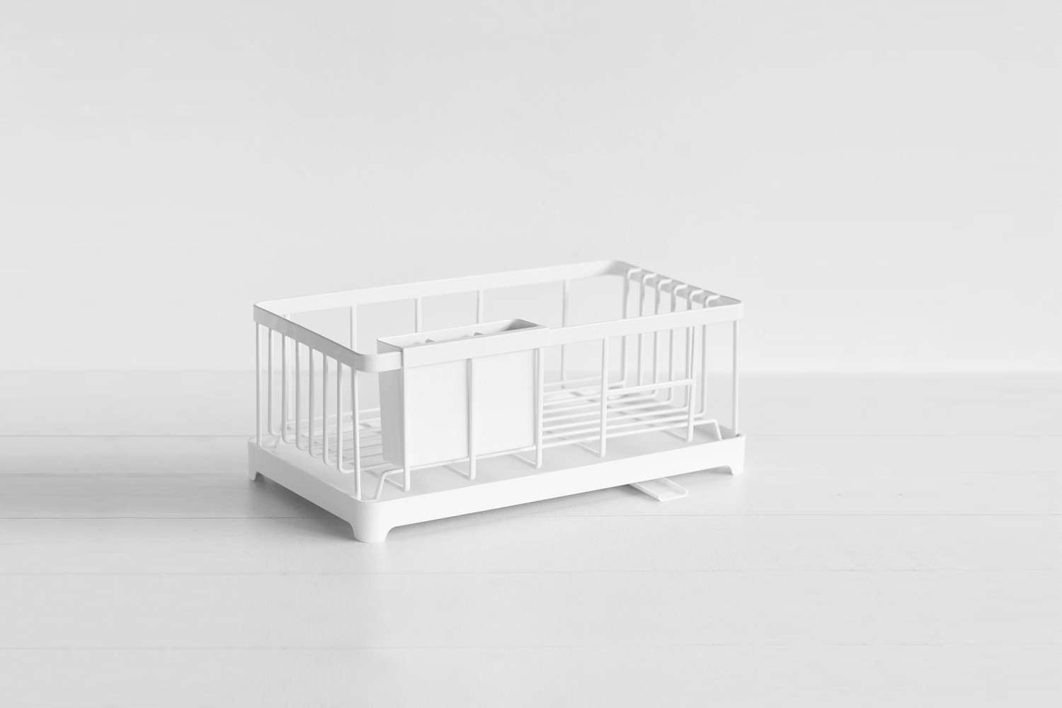 https://www.remodelista.com/wp-content/uploads/2018/06/yamazaki-tower-sink-drainer-wire-basket-white.jpg