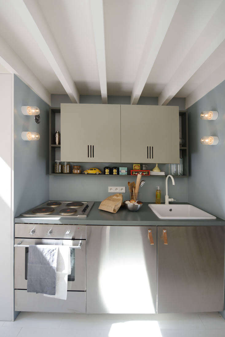 the kitchen is \1.8 meters (5.9 feet) from end to end and has an under the coun 21