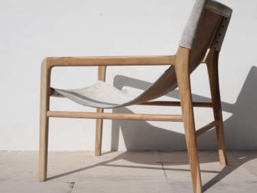 worn cowhide chair wood frame  