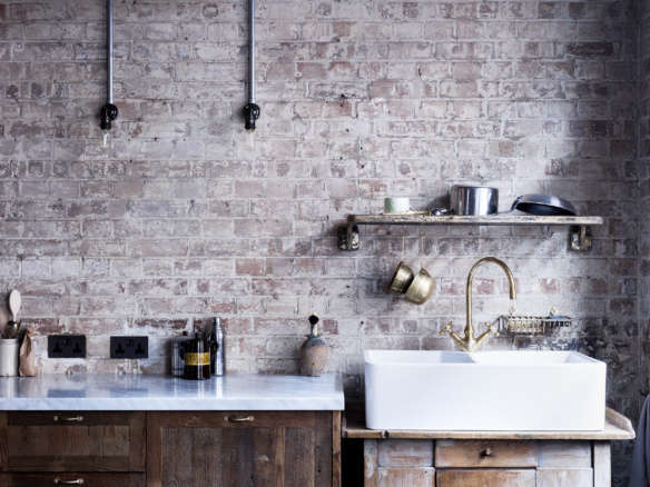 mark lewis interior design brick wall backsplash kitchen detail  