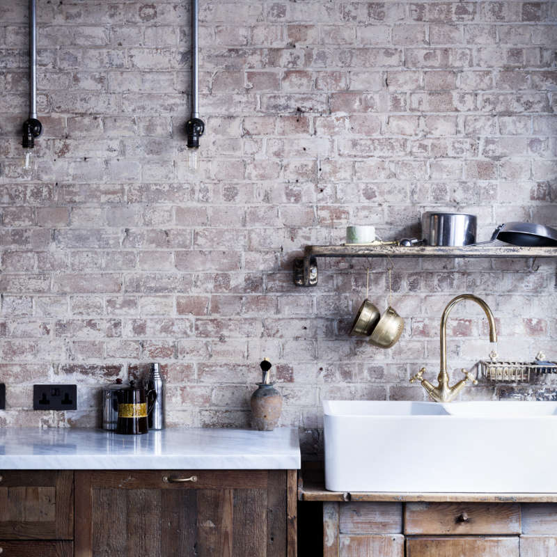 mark lewis interior design brick wall backsplash kitchen detail  