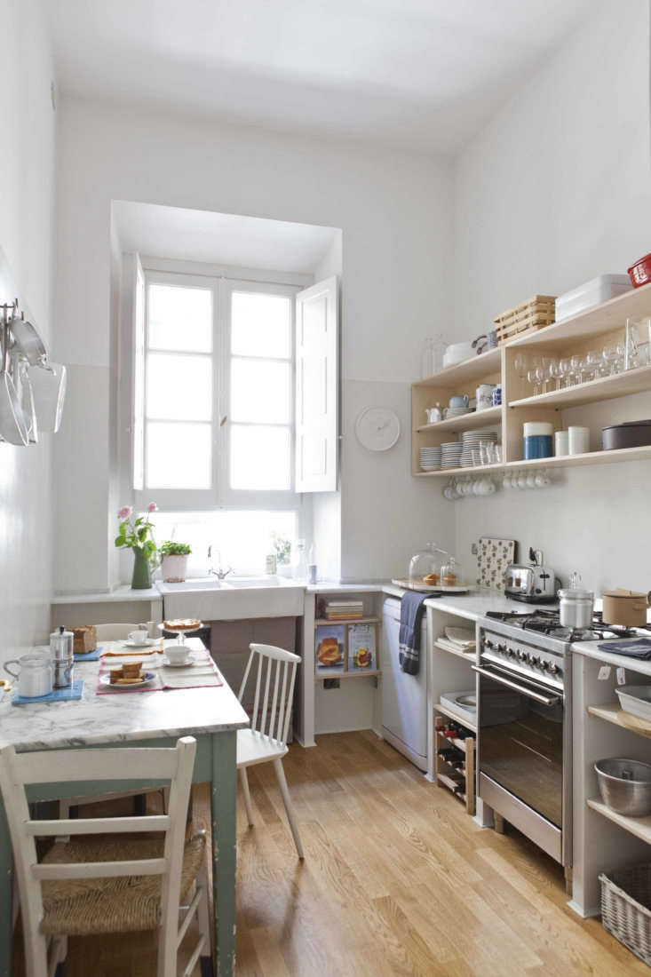 the petite l shaped kitchen, with the subtlest of color blocked walls, painted  10