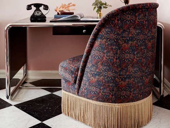 graduate hotel seattle guest room fringed chair crop  