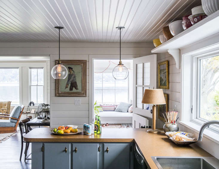 the only element that survived the renovation? the \1950s kitchen cabinets, now 19