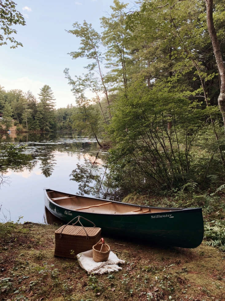 a canoe is always ready by the pond for a picnic—or a paddle out to get  19