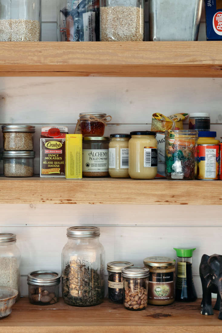 a peek at the various pantry items stored on the open shelves for easy access. 12