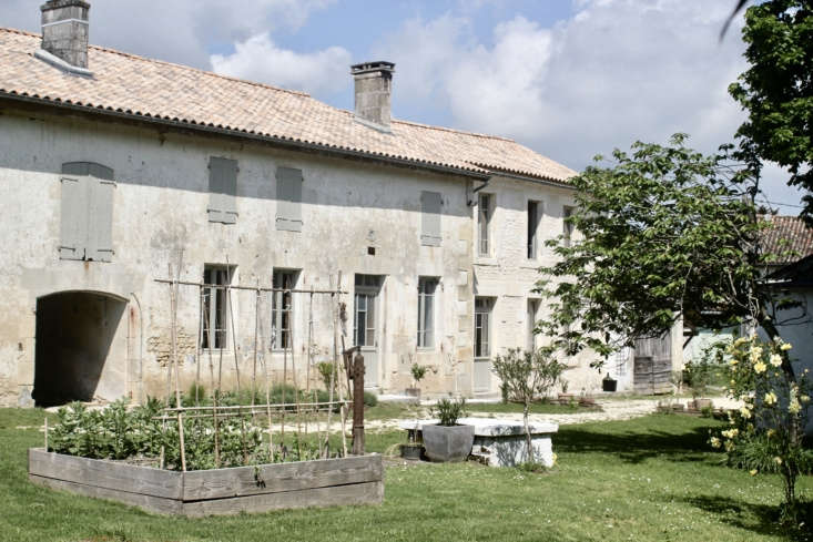 known as a charentaise, the early \19th century building pre dates the house an 19