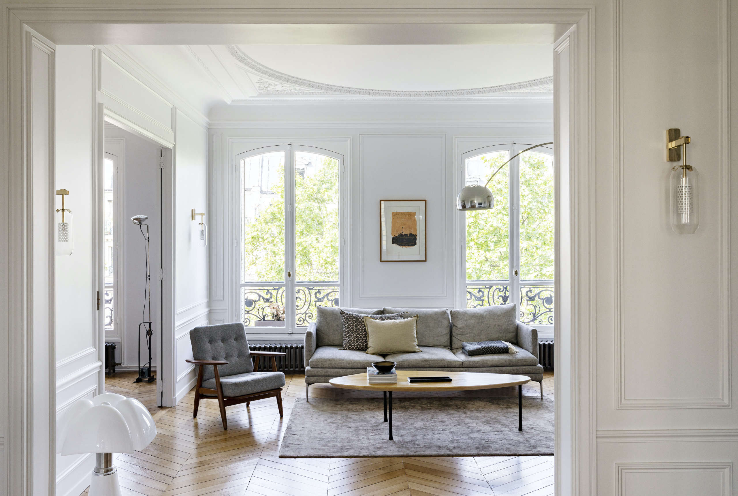 neutral tones, parisian oak flooring, and haussmanian architectural details mak 9