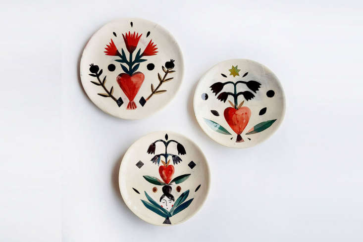 the flat talisman heart plates are &#8220;small flat plates decorated wit 9