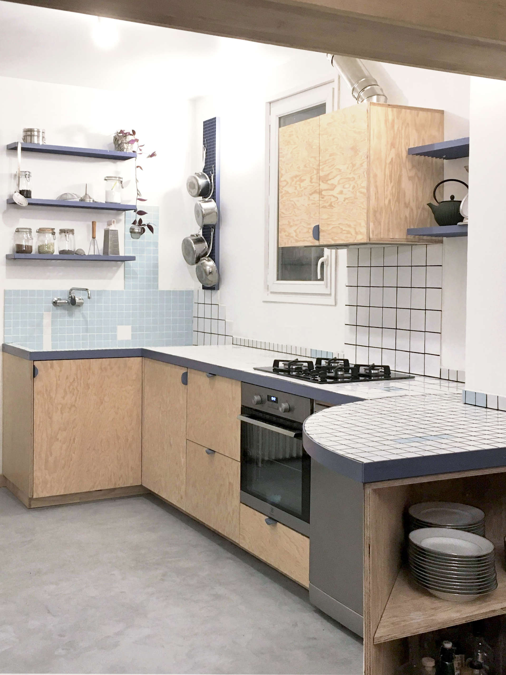https://www.remodelista.com/wp-content/uploads/2021/02/reclaimed-tiles-kitchen-by-127af-baptiste-potier-deborah-feldman-normandy-france-1-scaled.jpg