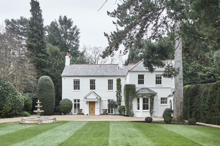 the house rests on seven acres of manicured grounds and woodland. the 100 year 9