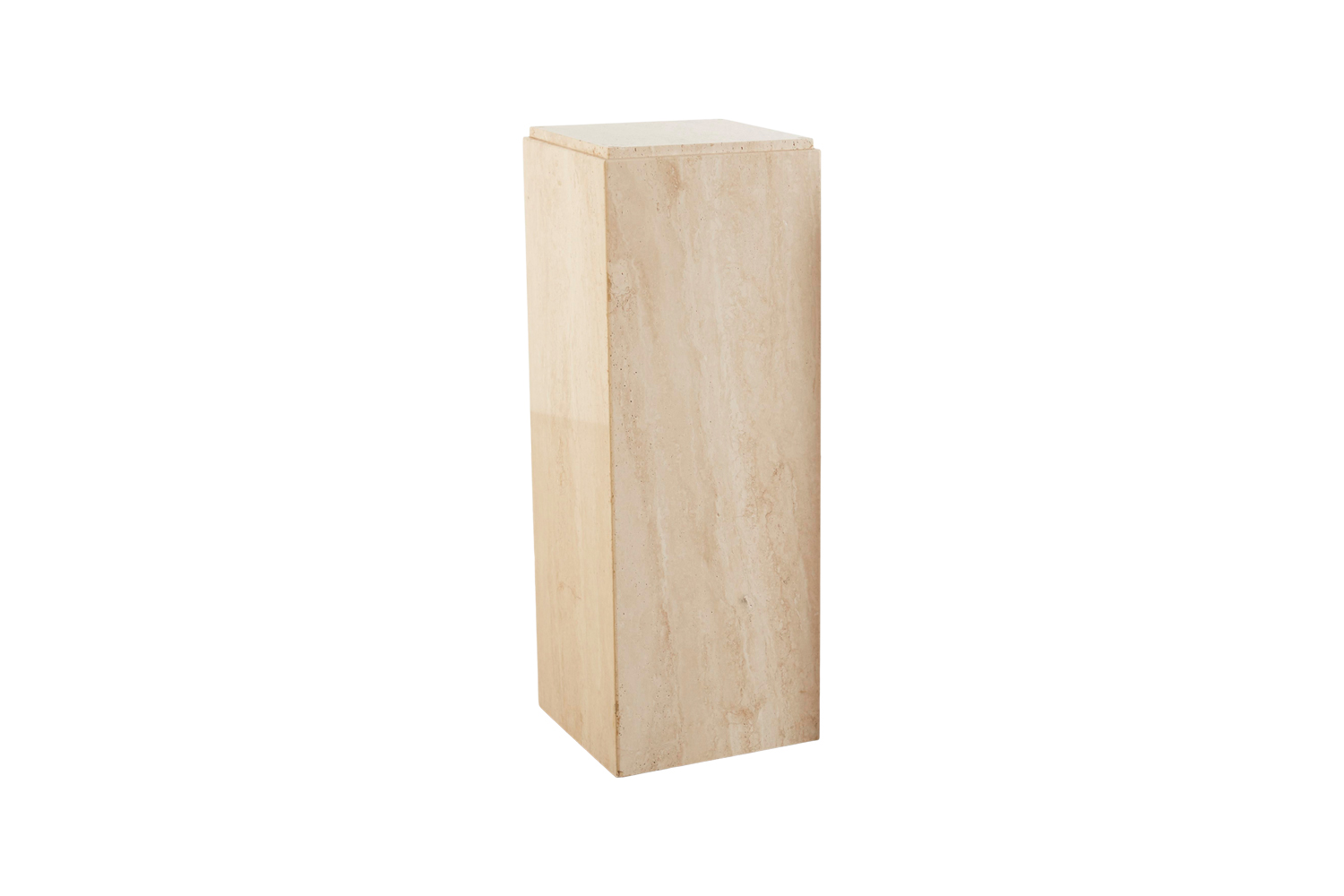 Similar Travertine Pedestals to the vintage one sourced by stylist, Anna Unwin, is $1,195 each at Chairish. For a new option in other types of stone, the Marble Plinth from Menu is $955.96 at Danish Design Store.