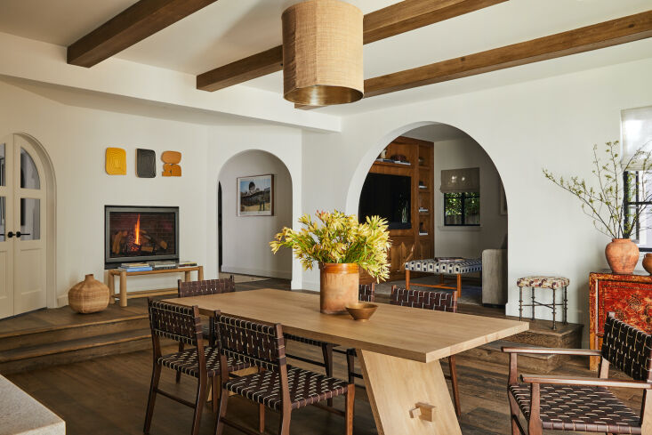 The project was remodel that included a new addition that houses the kitchen and adjacent dining area. The table was custom built by DISC in LA, inspired by an original design by OZ Architects Inc., and the chairs are from Big Daddy’s Antiques in Los Angeles. The