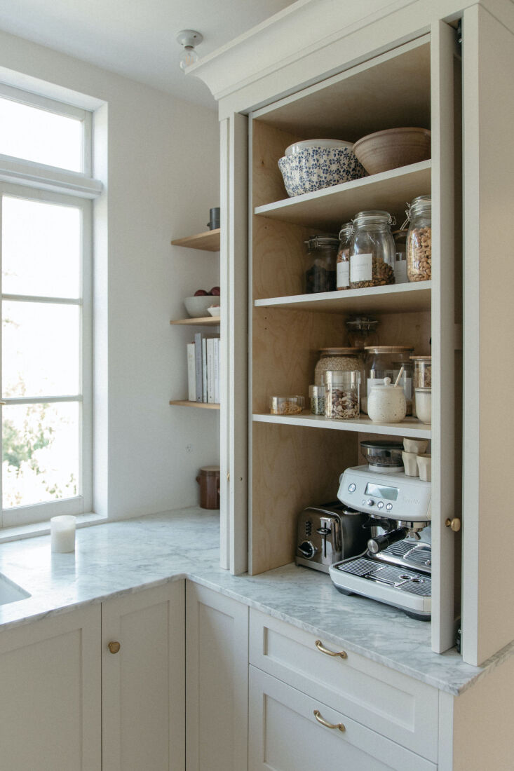 &#8220;i really love our pocket doors on the pantry. it’s a hidden coff 13