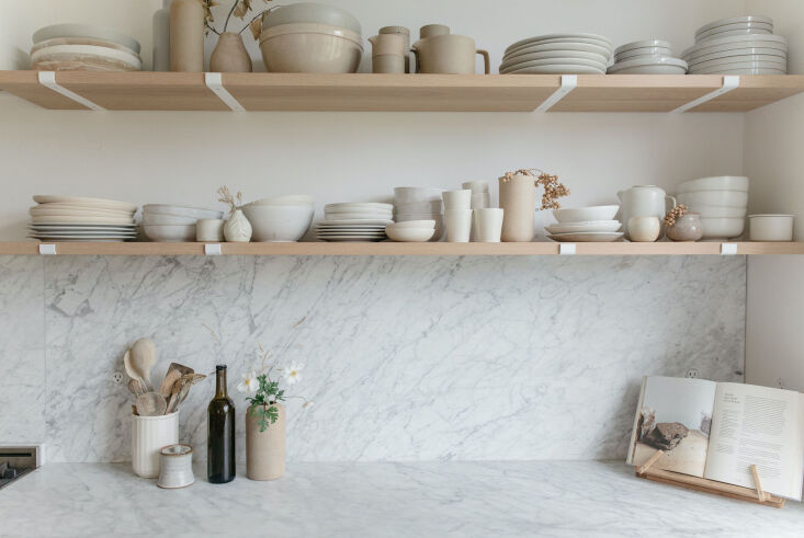 a must have for gillian? carrara marble countertops and backsplash. &#8\2\2 16