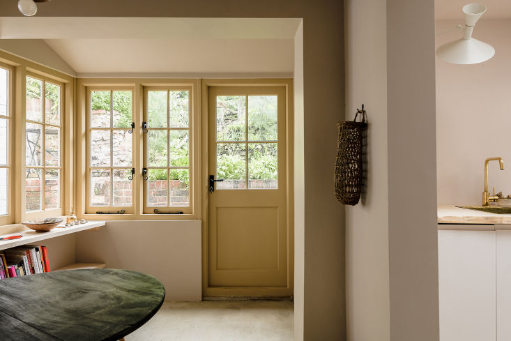 a door from the garden leads into the dining room, with box sash windows and a  10