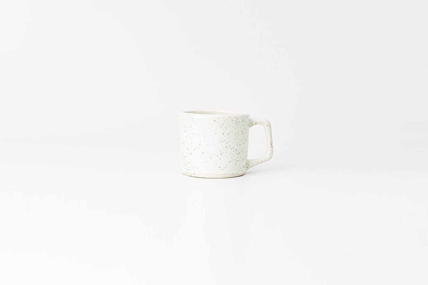 the haand 8 ounce short mug in birch (white with black spots) is $31 at haand. 12
