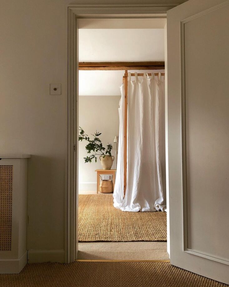 the curtained bed, minimalist edition: this one, in the uk, is wrapped in white 11