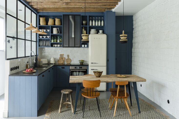 the petite kitchen is all new with a few preserved elements (the rough hewn bea 10