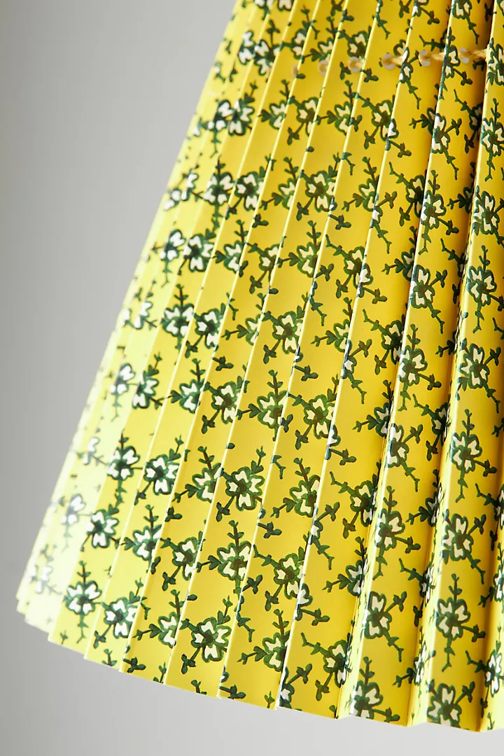 and a detail of the yellow pleated shade. 12