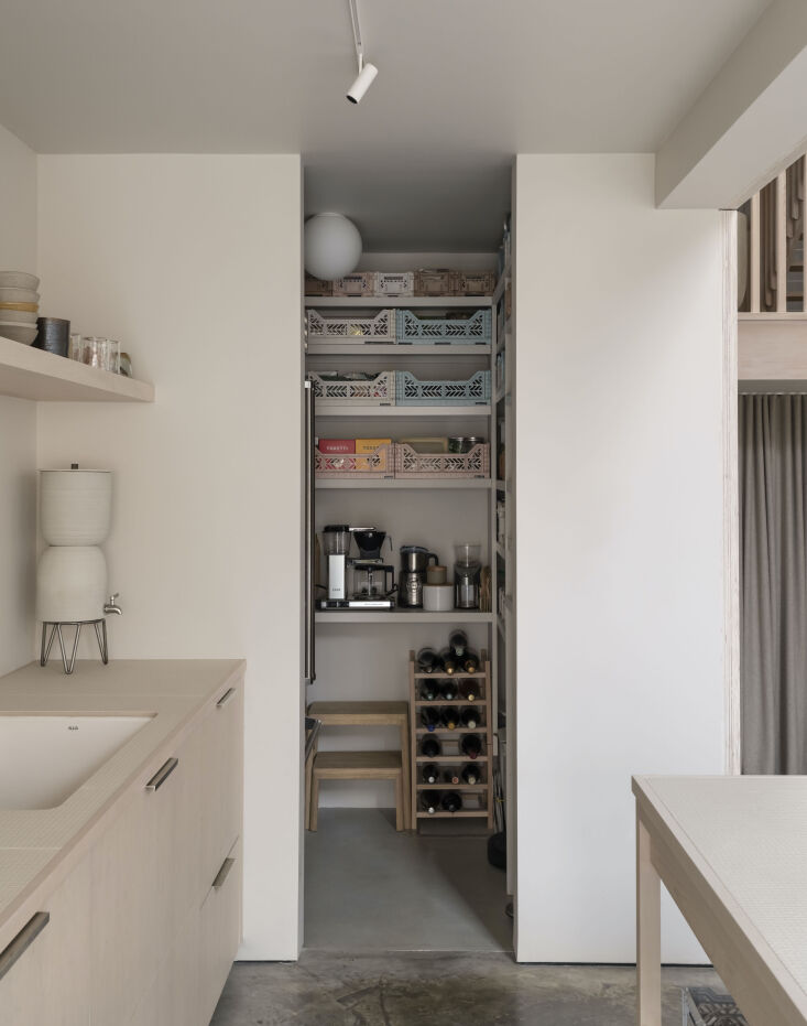 the fridge is concealed in an open pantry with outlets at counter height for ma 17