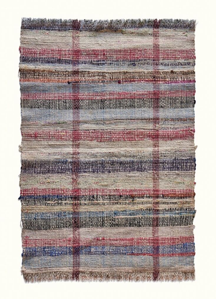 this 33 by 22 inch early american rag rug, $195, is one of several vintage  11
