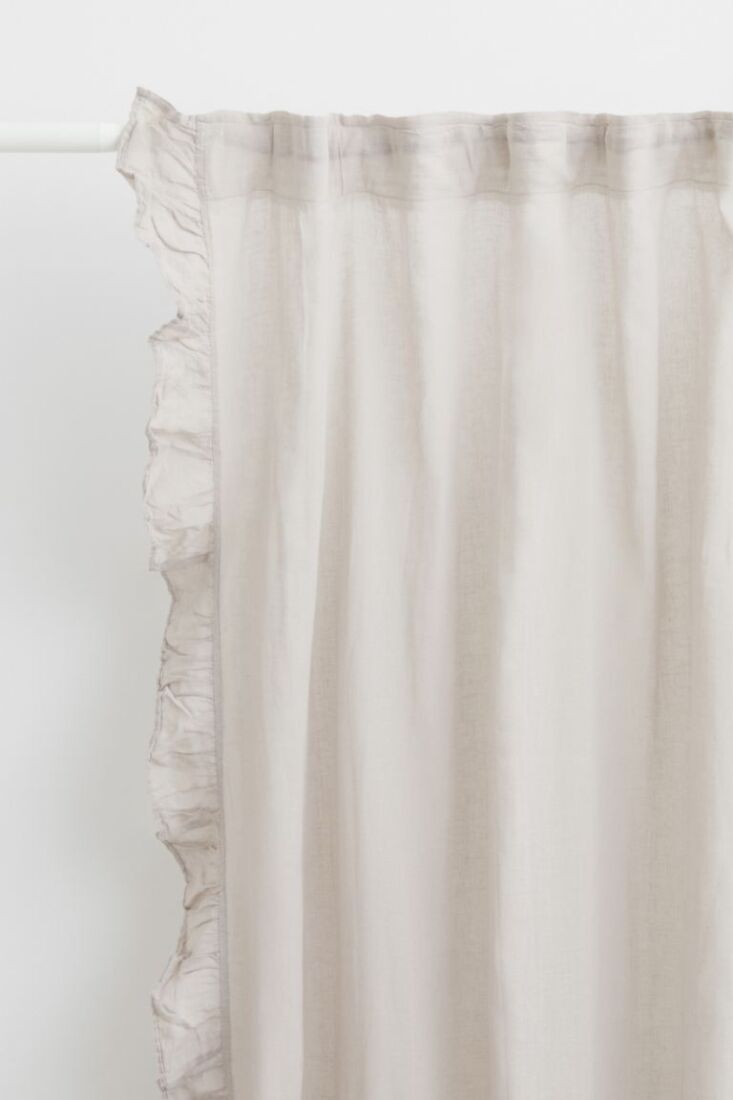 ruffle trimmed curtains, 60 percent cotton, 40 percent linen, are $69.99 for a 19