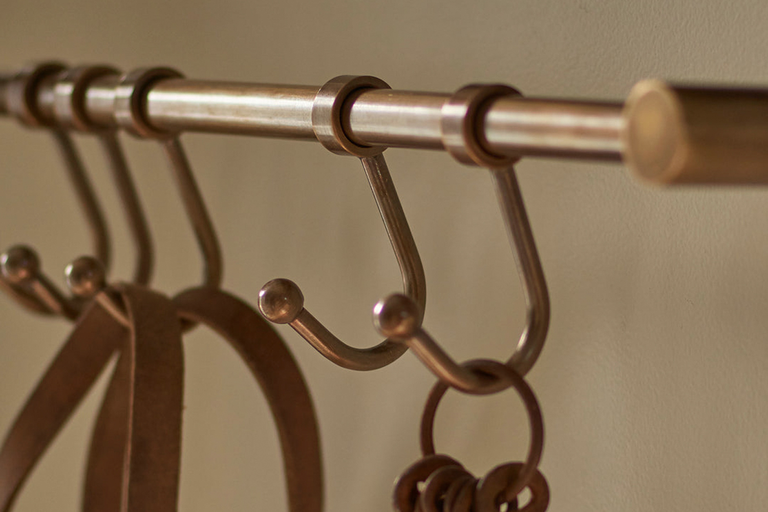 the rowen & wren bitra hook rail in antique brass is £74. 17