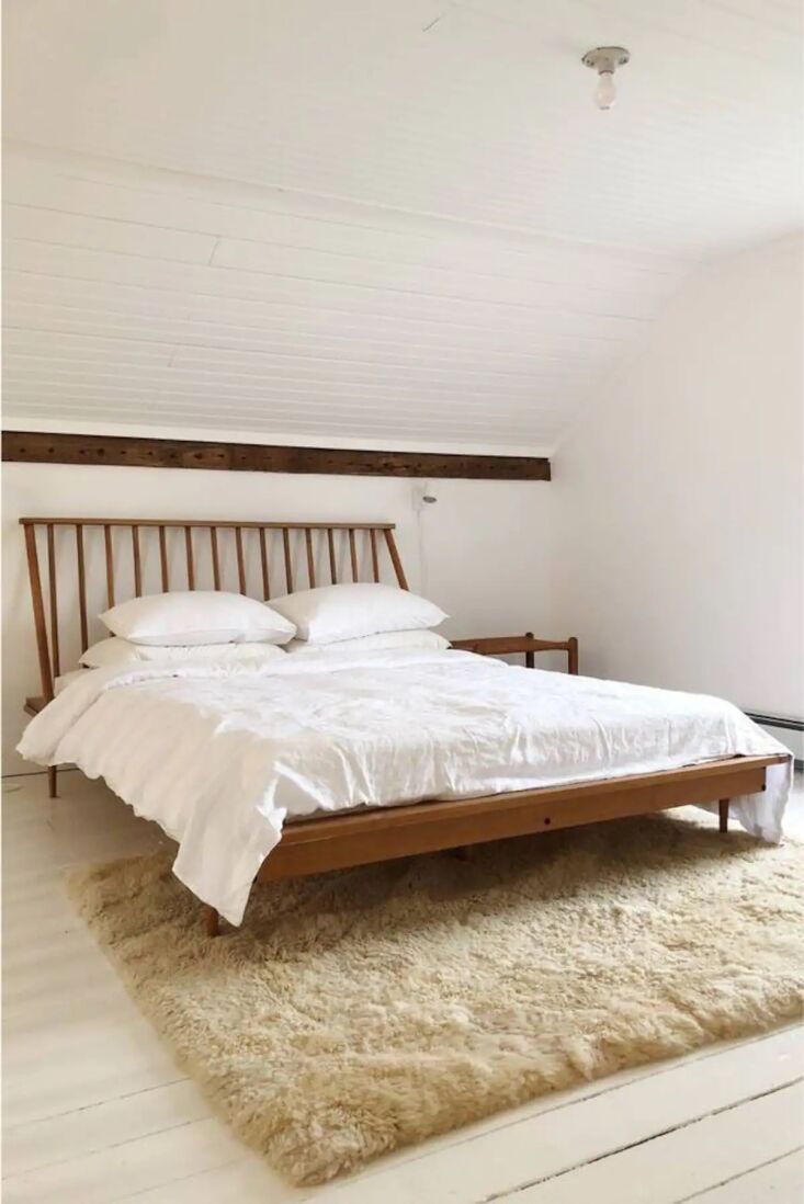 the bed was spotted in the upstairs primary suite of mill house no. \1, one of  9