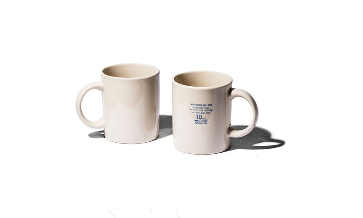 the standard 10 ounce mugs have stamped on care instructions in lieu of design 10