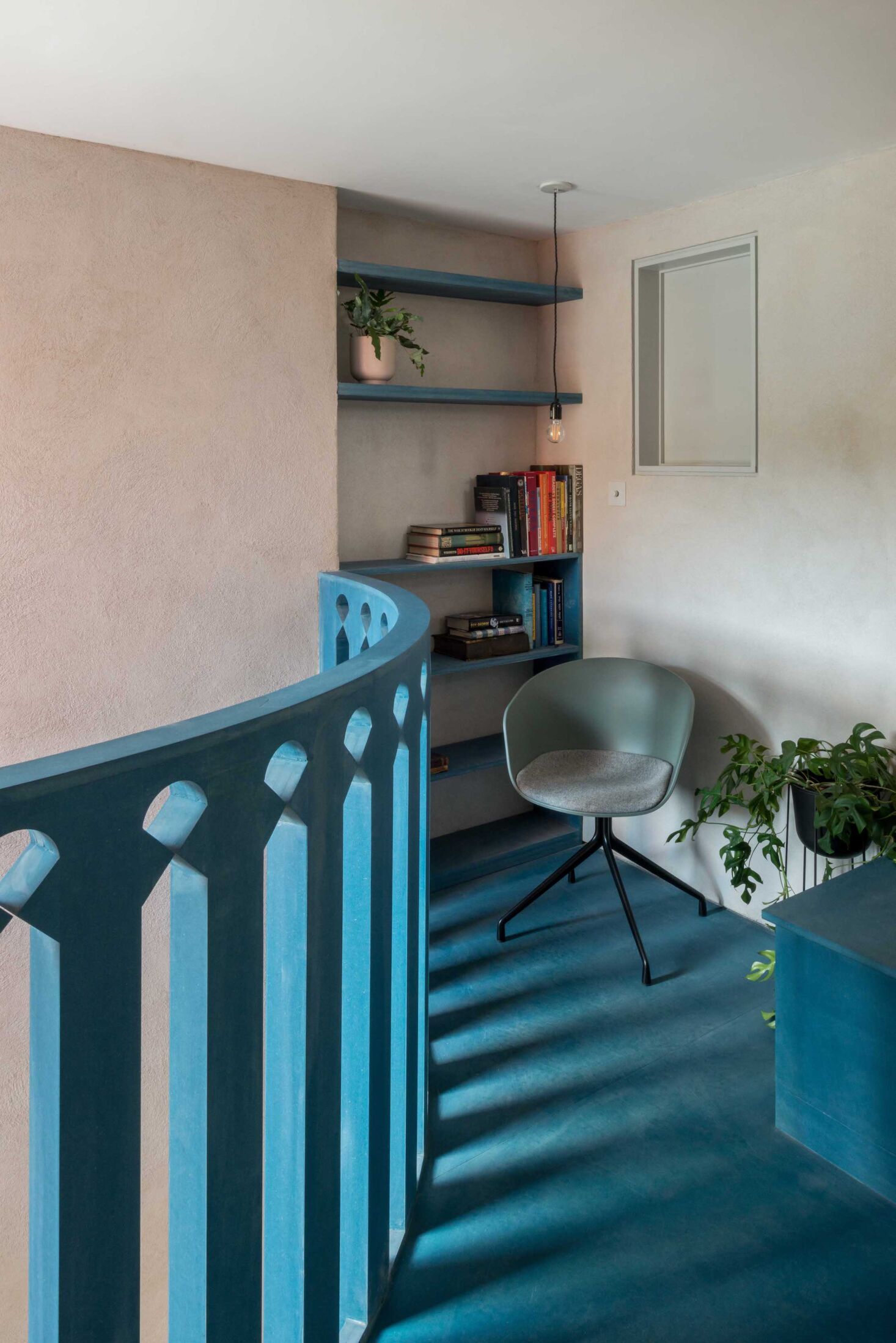 new mezzanine with blue balustrade, the house recast by studio ben allen, north 16