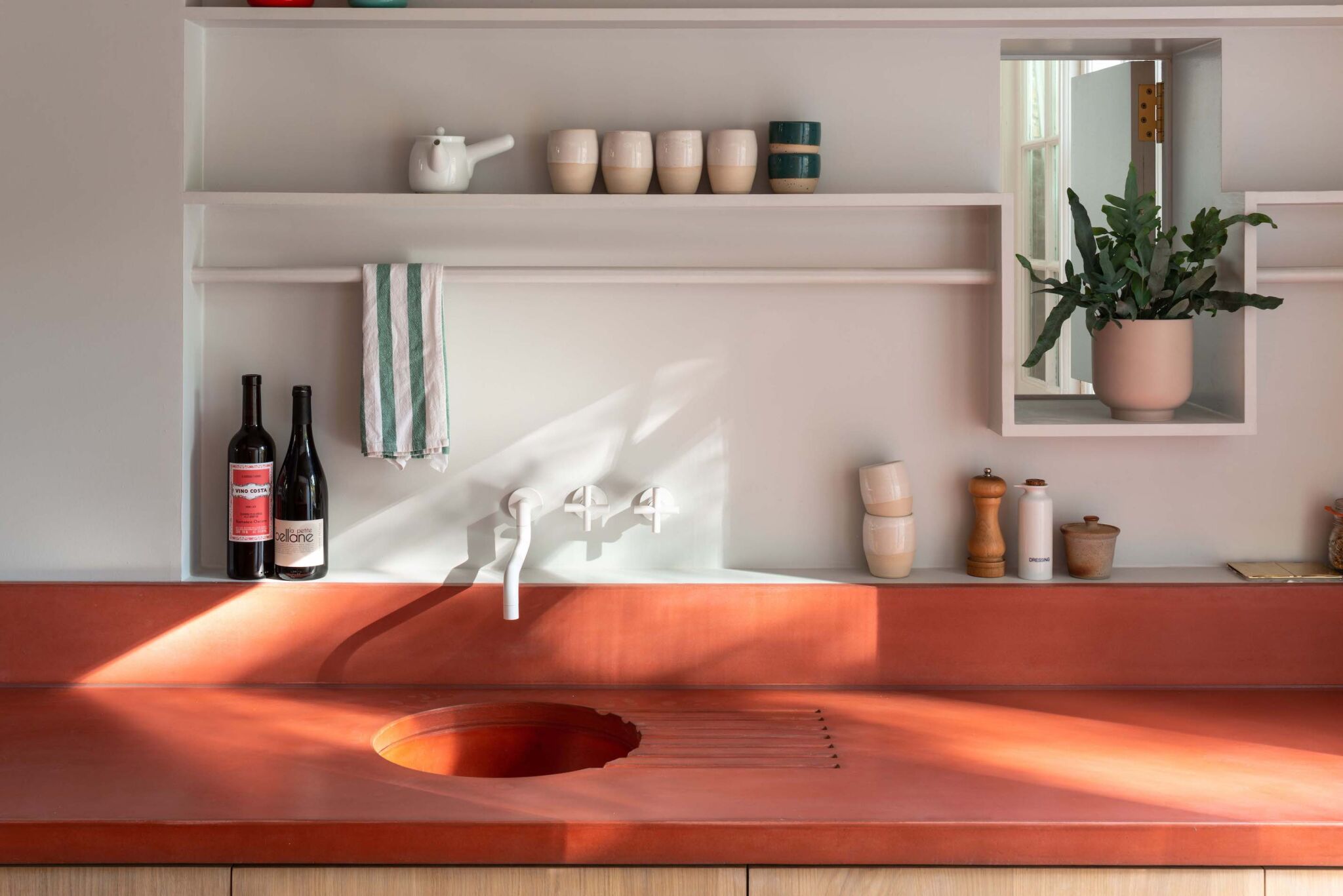 pigmented concrete kitchen, the house recast by studio ben allen, north london. 9