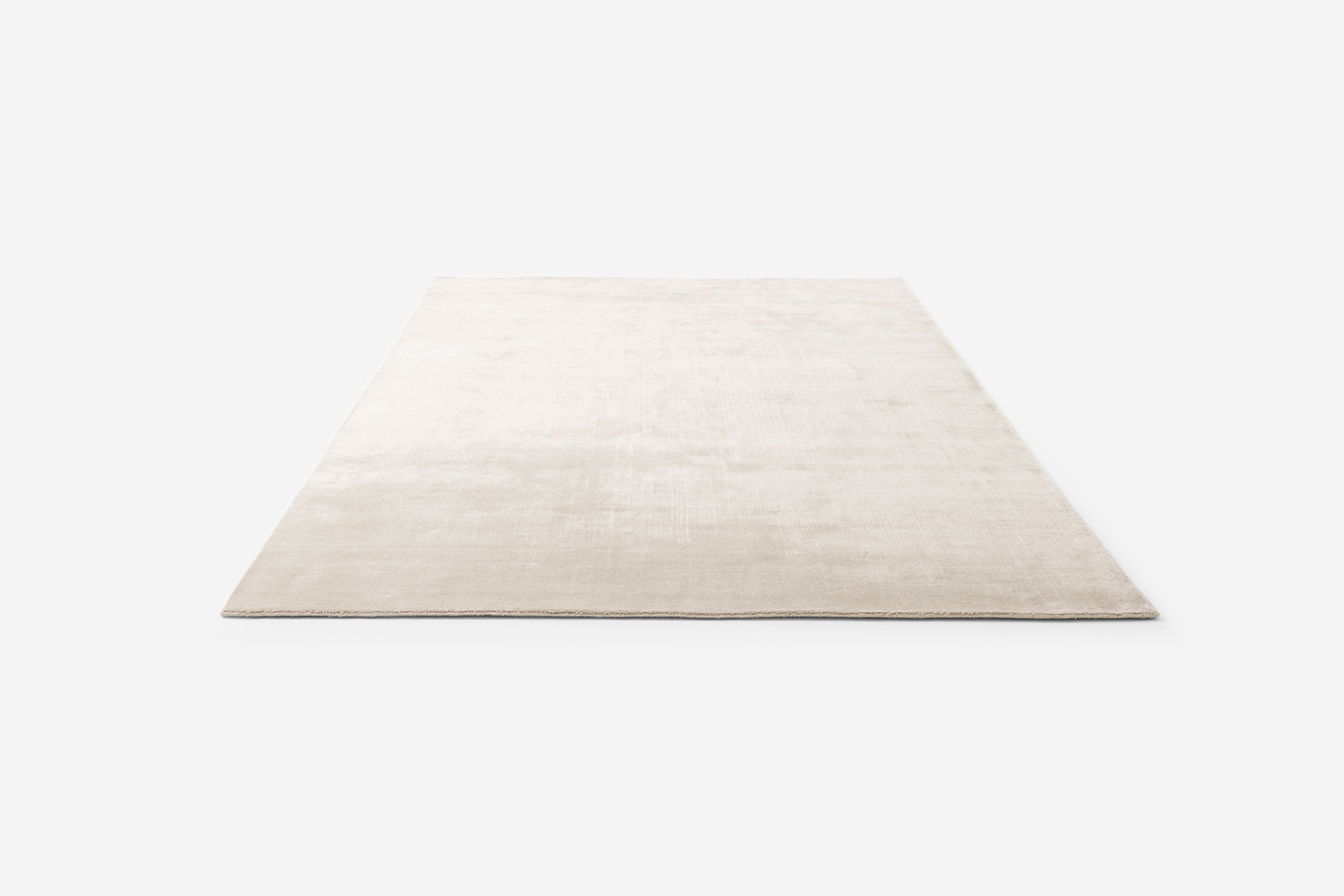 the vipp wool bamboo rug in white is designed for the living room or bedroom;  21