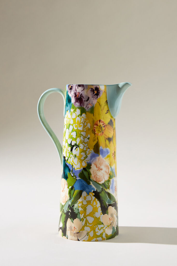 above: the hand painted stoneware livia pitcher (\$68) adds brightness to the t 11