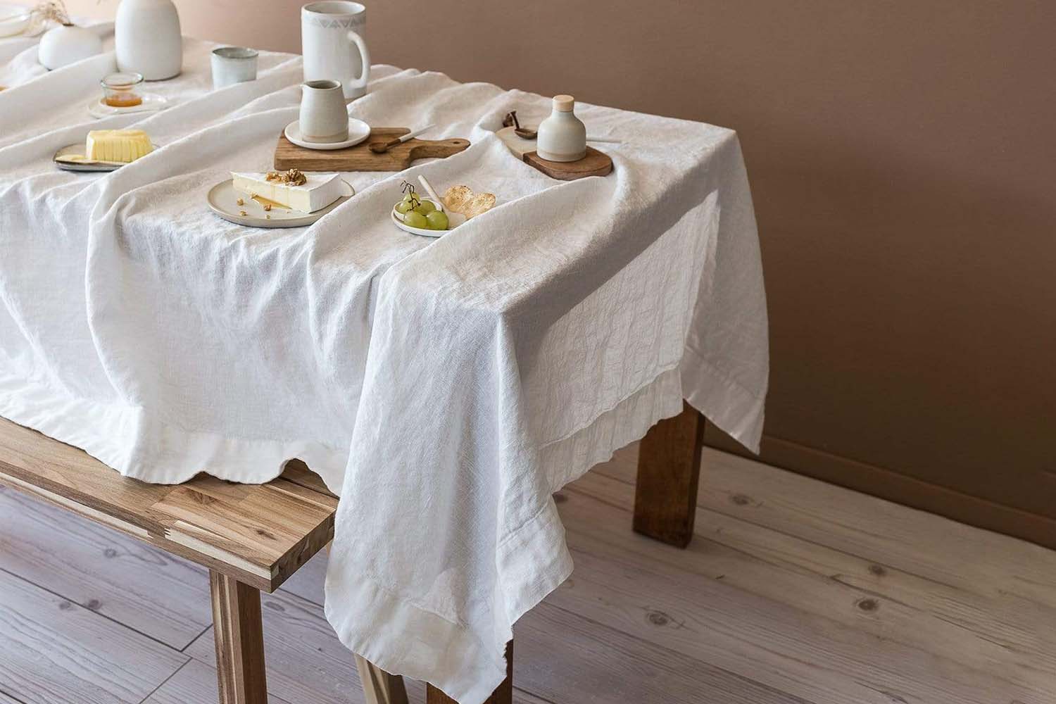 the square rough linen orkney linen tablecloth in white is \$\145. 19