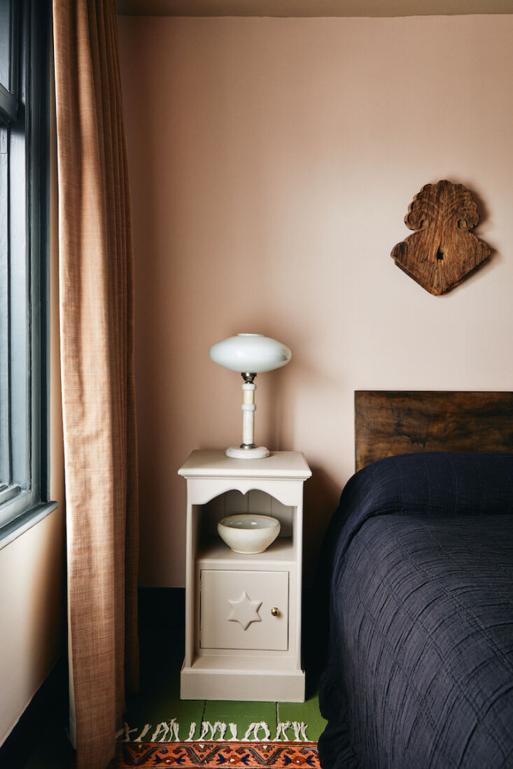 more shape, color, and texture in the guest bedroom, which features a hanging w 22