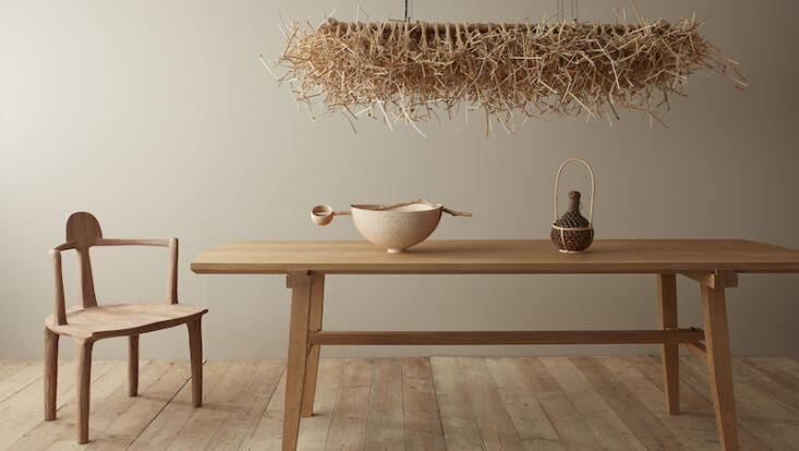 the exhibit features the babu chair by sasa works; knap light by annemarie o&am 12