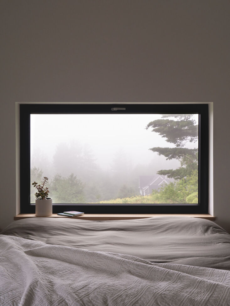 the view from bed in heritage meets high efficiency: a saltbox passive house in 14