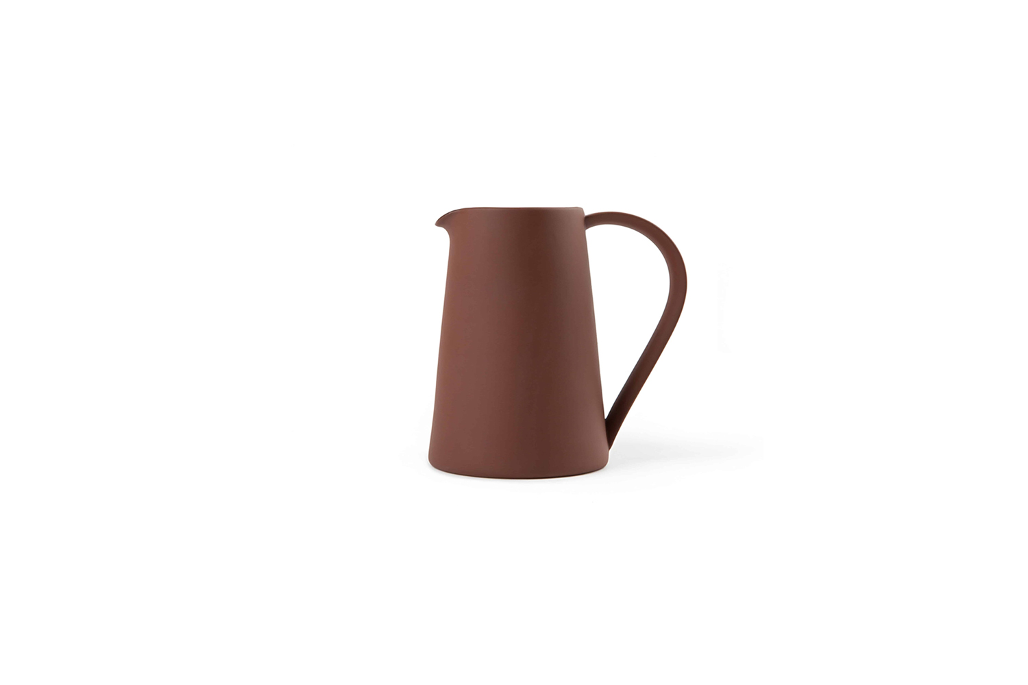 the another country pottery series pitcher in terracotta is £58. 21