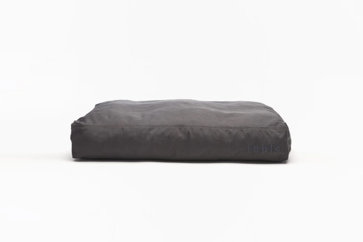 the fable dog bed in dark shadow starts at \$95. 22